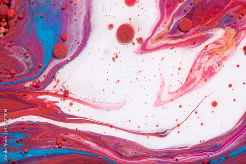 Cuadro en lienzo Abstract background of mixed red, blue, white, and pink oily paints