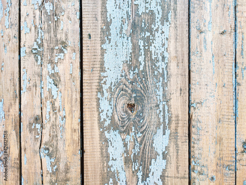 Old weathered painted wooden plank textured background