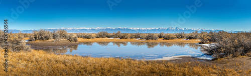 Panorama of the Rocky Mountains seen from the Russel Lakes State Widlife Area, Colorado