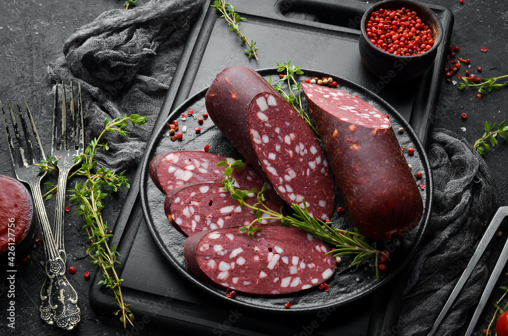 Salami with lard. Moscow traditional sausage. Top view. Free space for text. Salami with lard. Moscow traditional sausage. Top view. Free space for text.