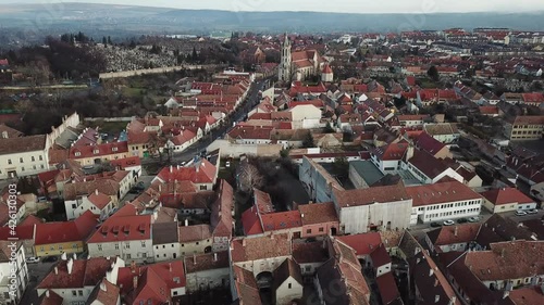 Cinematic aerial drone view of the charming quaint historical inner city, downtown of Sopron, a major tourist destination in Győr-Moson-Sopron County, Western Transdanubia in Northwestern Hungary photo