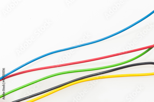 Colored wires on white background