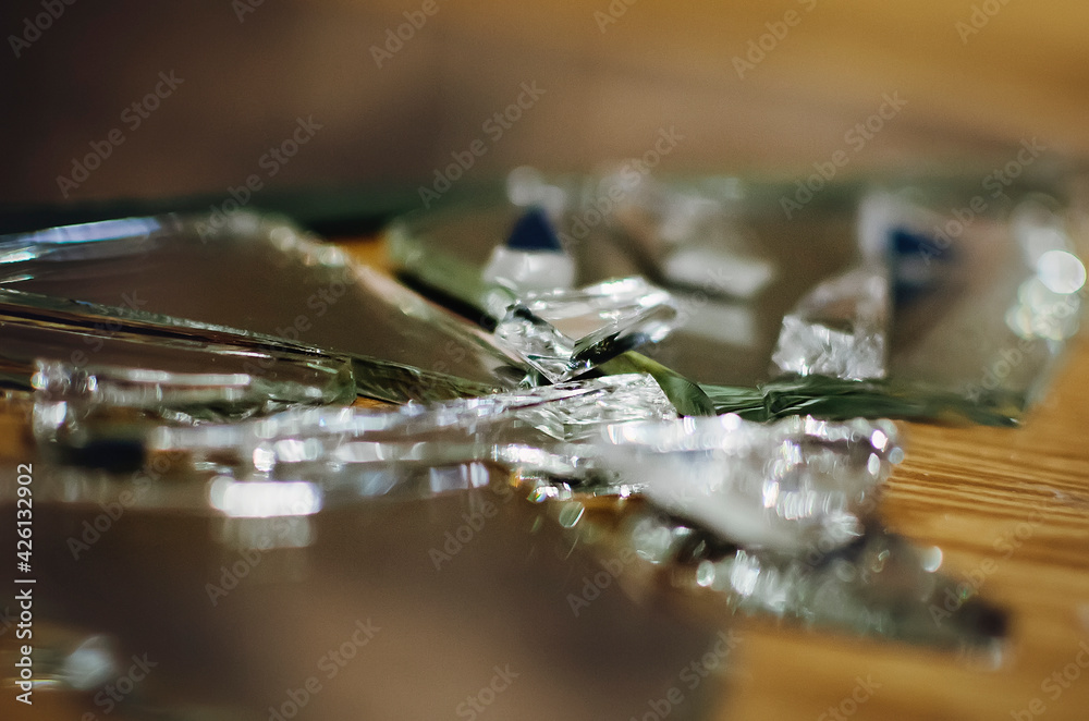 Shards of a broken mirror, close-up. Shards of a broken mirror, close-up.