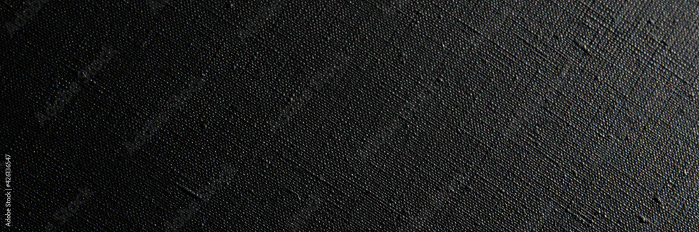 dark creative background: black primed linen canvas, uneven lighting, toning dark creative background: black primed linen canvas, uneven lighting, toning