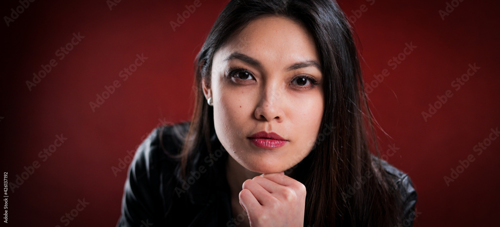Sexy Asian woman in front of red velvet - studio photography Sexy Asian woman in front of red velvet - studio photography