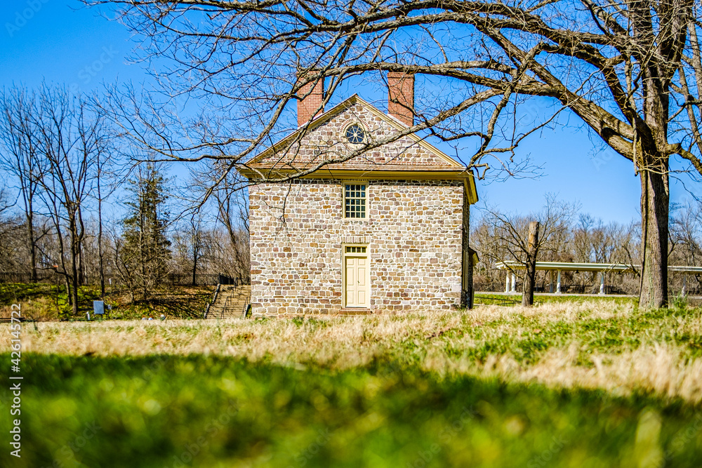Looking to an old stone historic building at Valley Forge National Park in Pennsylvania. Looking to an old stone historic building at Valley Forge National Park in Pennsylvania.