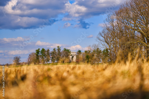 The National Memorial Arch stands in the distance at Valley Forge National Park in Pennsylvania.
