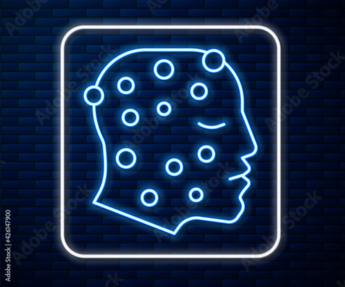 Glowing neon line Face with psoriasis or eczema rash icon isolated on brick wall background. Concept of human skin response to allergen or chronic body problem. Vector