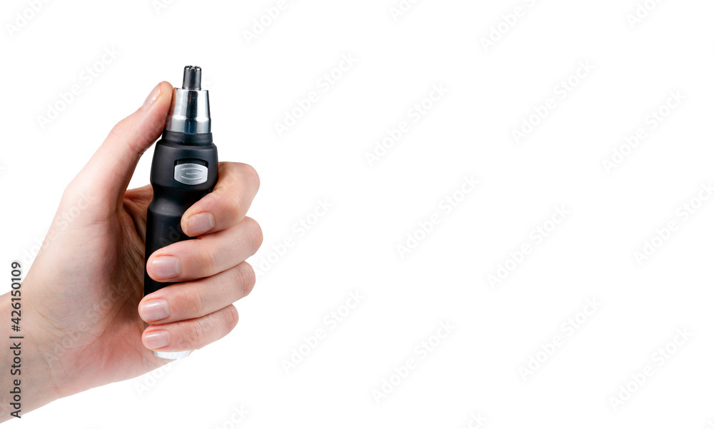 Close-up, trimer in hand. White background. Close-up, trimer in hand. White background.
