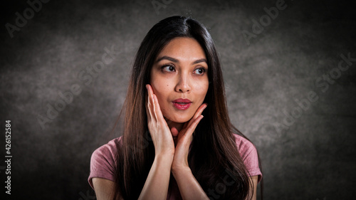 Studio portrait of a pretty Asian girl - studio photography