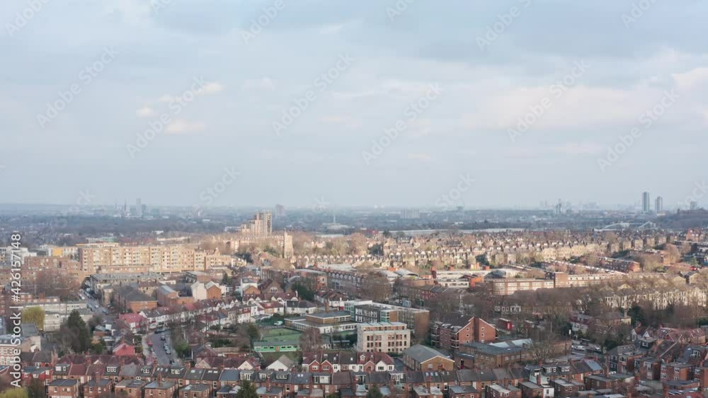 Dolly forward drone shot over suburban north London near alexandra palace Dolly forward drone shot over suburban north London near alexandra palace