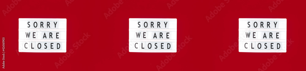 Banner sorry we are closed, sign, text message on a lightbox, text inscription, top view Banner sorry we are closed, sign, text message on a lightbox, text inscription, top view