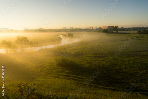 morning mist over the field © Evgenii Ryzhenkov