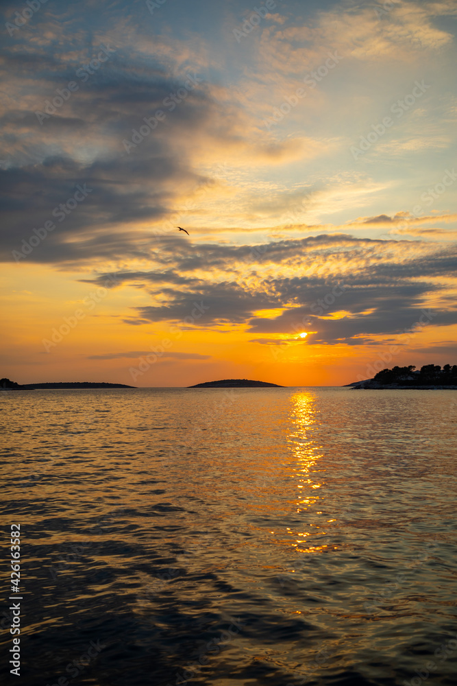 Beautiful orange sunset over sea in Croatia Beautiful orange sunset over sea in Croatia