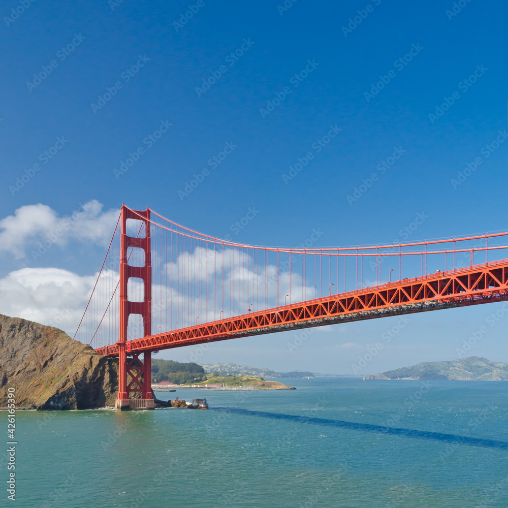 The Golden Gate Bridge in San Francisco with beautiful ocean in background The Golden Gate Bridge in San Francisco with beautiful ocean in background