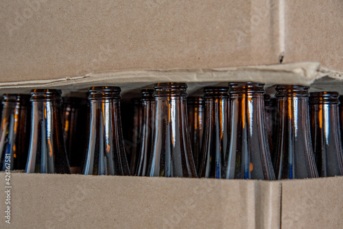 dark bottles for making craft beer in small factory cpn pieces of cardboard craft