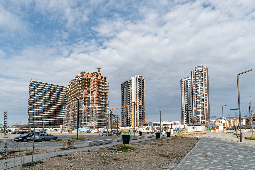 Belgrade, Serbia - March 28, 2021: Construction site in Belgrade Waterfront building complex. Construction of buildings on the bank of the Sava River in the city center. Belgrade, Serbia - March 28, 2021: Construction site in Belgrade Waterfront building complex. Construction of buildings on the bank of the Sava River in the city center.