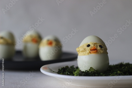Devilled egg chicks prepared as Easter Eggs. Traditional celebration of making eggs as the symbol of new life and resurrection © Trending Now