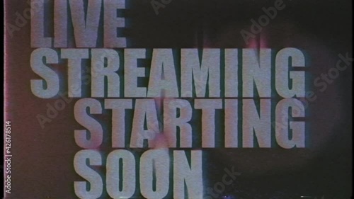 Live Streaming starting soon screen with retro VHS glitch effect, loopable footage