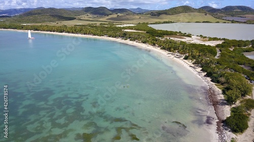 Aerial view of a white sand beach in Martinique
