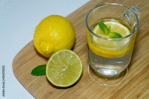 Fresh drink with lemon, lime and mint © Kalina