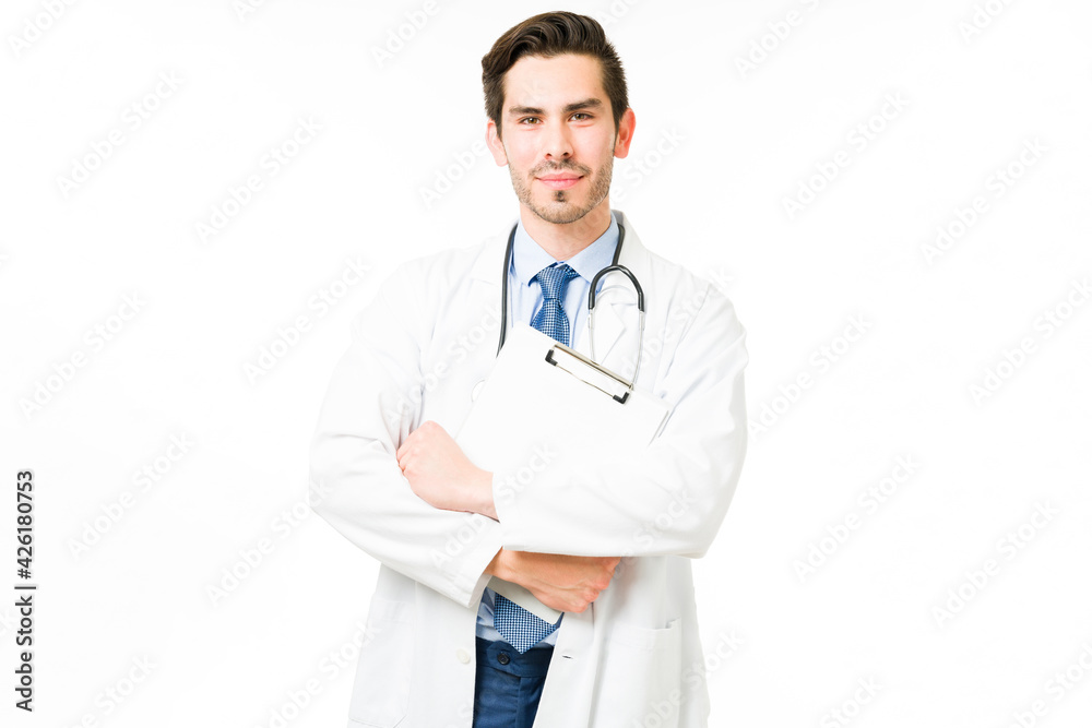 Portrait of a professional doctor smiling while working Portrait of a professional doctor smiling while working