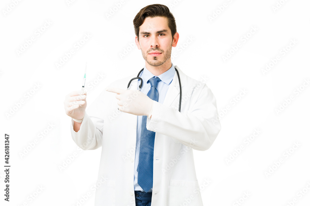 Attractive doctor ready to vaccinate a patient Attractive doctor ready to vaccinate a patient