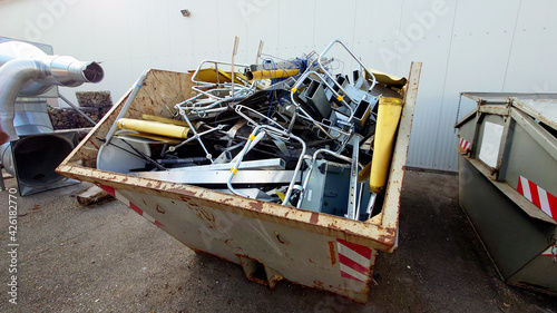 a container full of metallic scrap