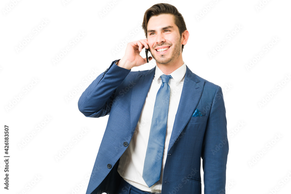Business man making a work appointment on the phone Business man making a work appointment on the phone