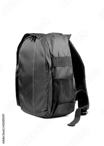 Black camera backpack isolated on white background, side view