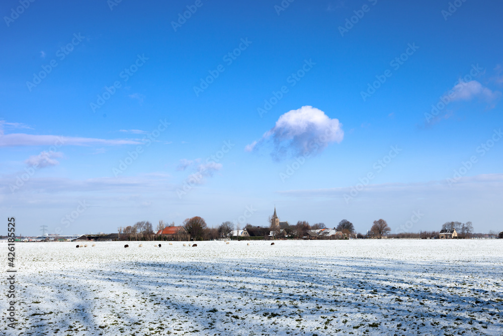 't Woudt village with its protestant church is a protected village near Delft in The Netherlands