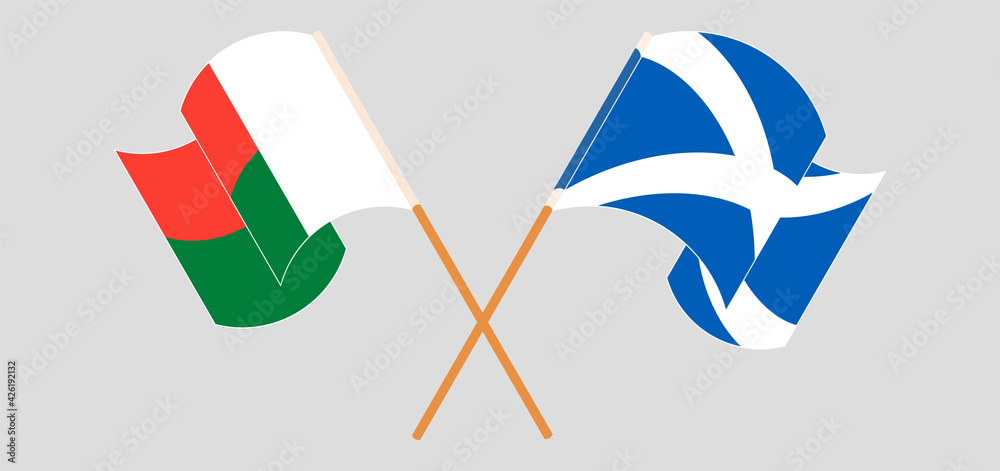 Crossed and waving flags of Madagascar and Scotland Crossed and waving flags of Madagascar and Scotland