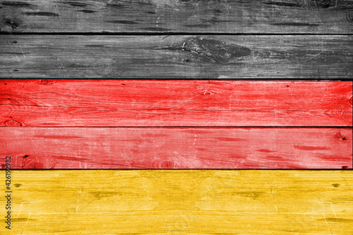 German Flag painted on old wood texture background. October 3 German Unity Day. Oktoberfest...