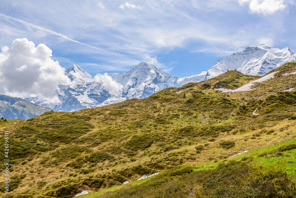 Fototapeta premium Crossing the Alps. Hiking trail in the Alps.