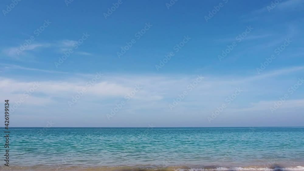 Aerial view paradise of topical sea and beach, timelapse footage of blue sky and clouds dancing over the blue ocean, clear air at seacoast scenery. summer hot weather and season. traveling in holiday Aerial view paradise of topical sea and beach, timelapse footage of blue sky and clouds dancing over the blue ocean, clear air at seacoast scenery. summer hot weather and season. traveling in holiday