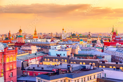 Aerial sunrise view of the center of Moscow with Kremlin tower and other buildings. World famous Moscow landmarks for tourism and travel.