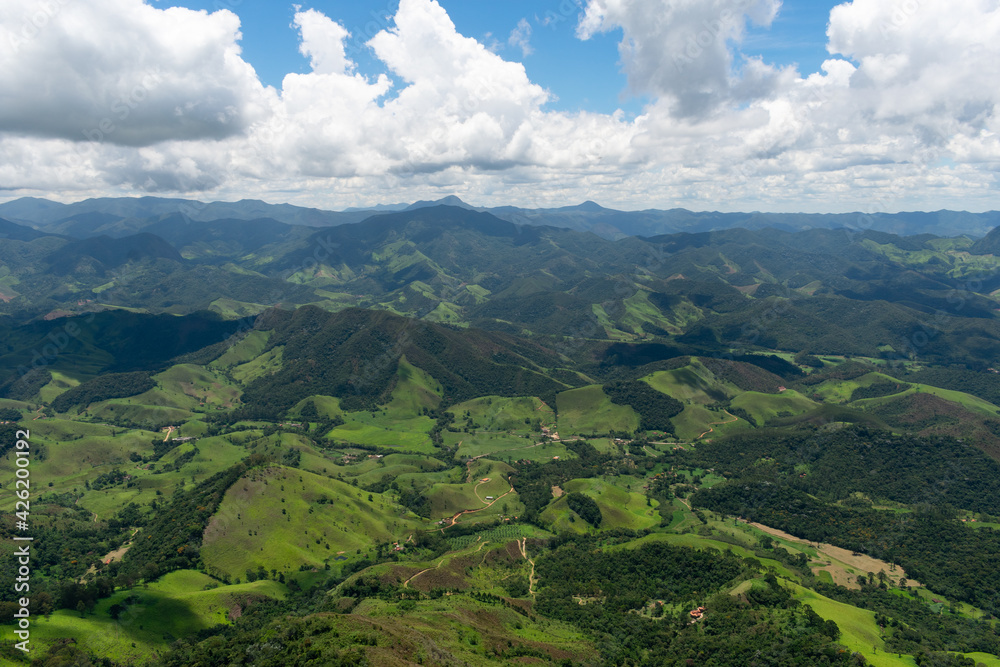Fototapeta premium rural landscape with mountains and clouds