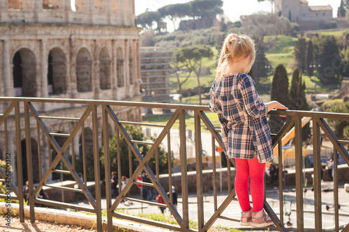 little girl near the colosseum in Rome, Italy