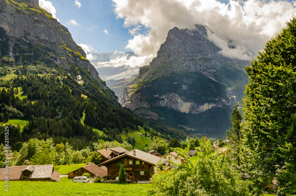 Amazing mountain view of Grindelwald scenery with a house, Switzerland