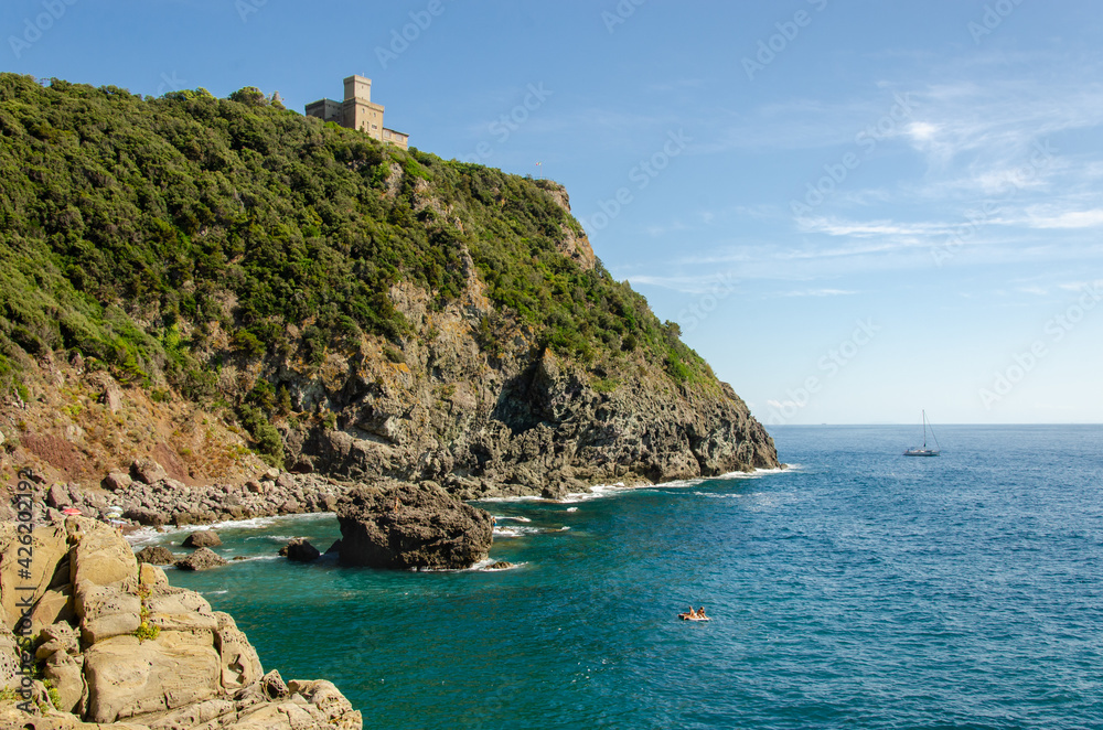 Cala Del Leone, Castel Sonnino Italy. Coast castle on the rock with the sea. Tuscany