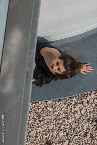 Girl below bridge