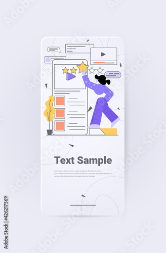 businesswoman holding review stars rating customer feedback satisfaction level online survey concept