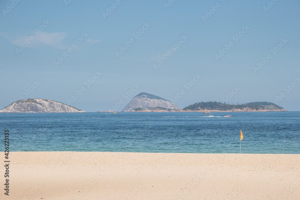 empty ipanema beach, during the second wave of the coronovirus pandemic in rio de janeiro .