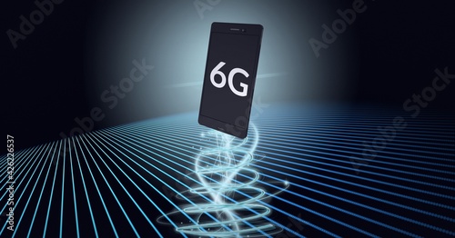 Composition of the word 6g over a floating smartpone with silver spirals in background photo