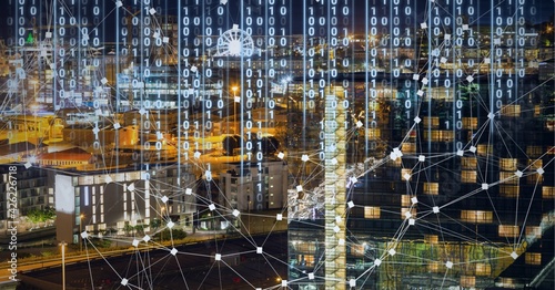 Composition of net of connections with digital interface over a cityscape in background