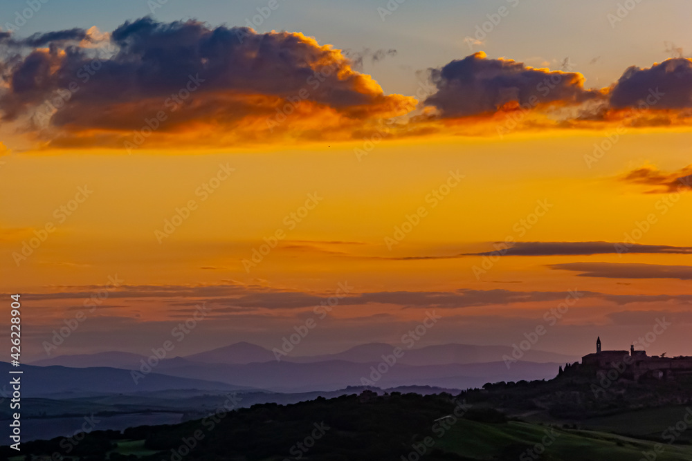 Sunset over quaint Tuscan Village Italy