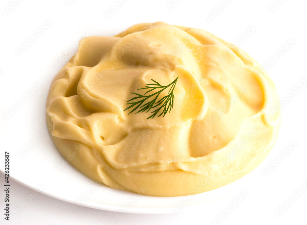 Isolated mashed potatoes on the white plate. Isolated mashed potatoes on the white plate.