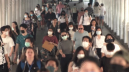 Wallpaper Mural 4K, Blurred defocused view of Concept of coronavirus quarantine, MERS-Cov. Large crowd of business people with medical face mask. Air pollution. Torontodigital.ca