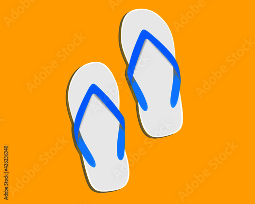a pair of flip-flops on a yellow background for footwear fashion content