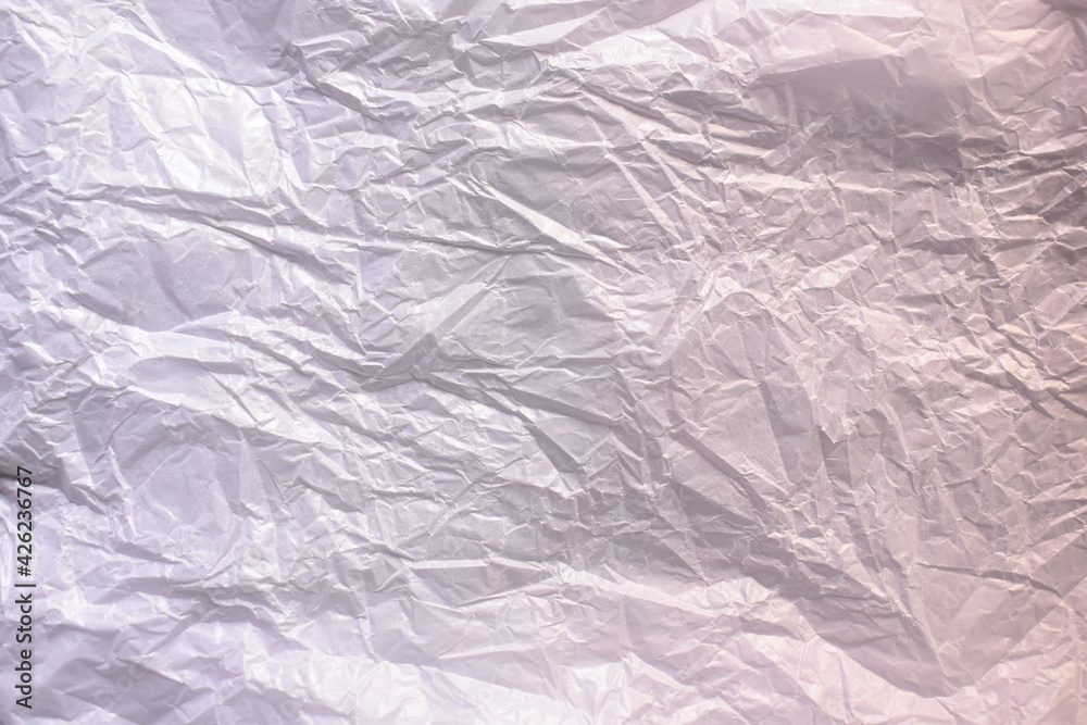 White color crumpled baking parchment paper textured background White color crumpled baking parchment paper textured background